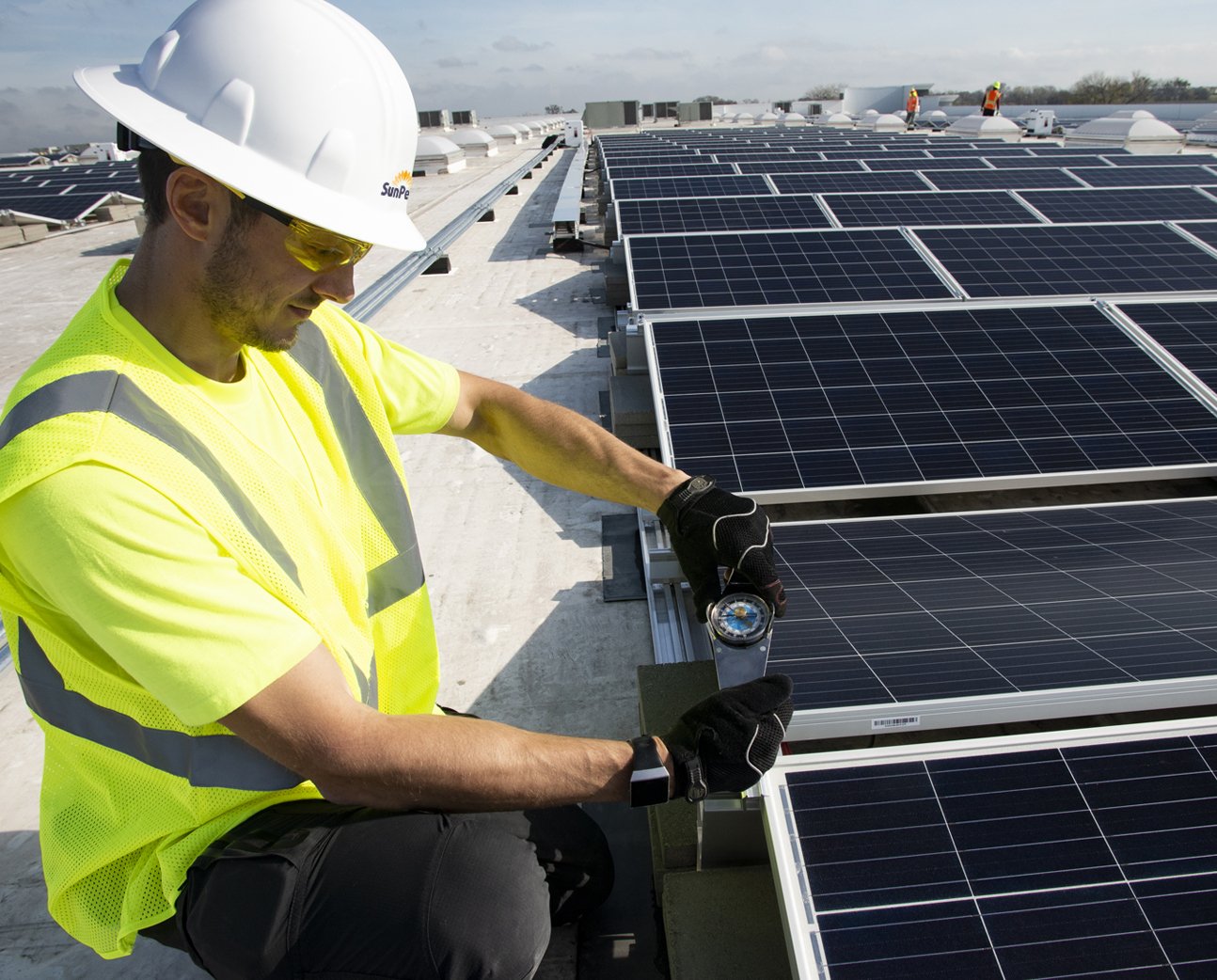 A member of SunPeak’s installation team on a jobsite, representing SunPeak’s work as a commercial solar installation company.