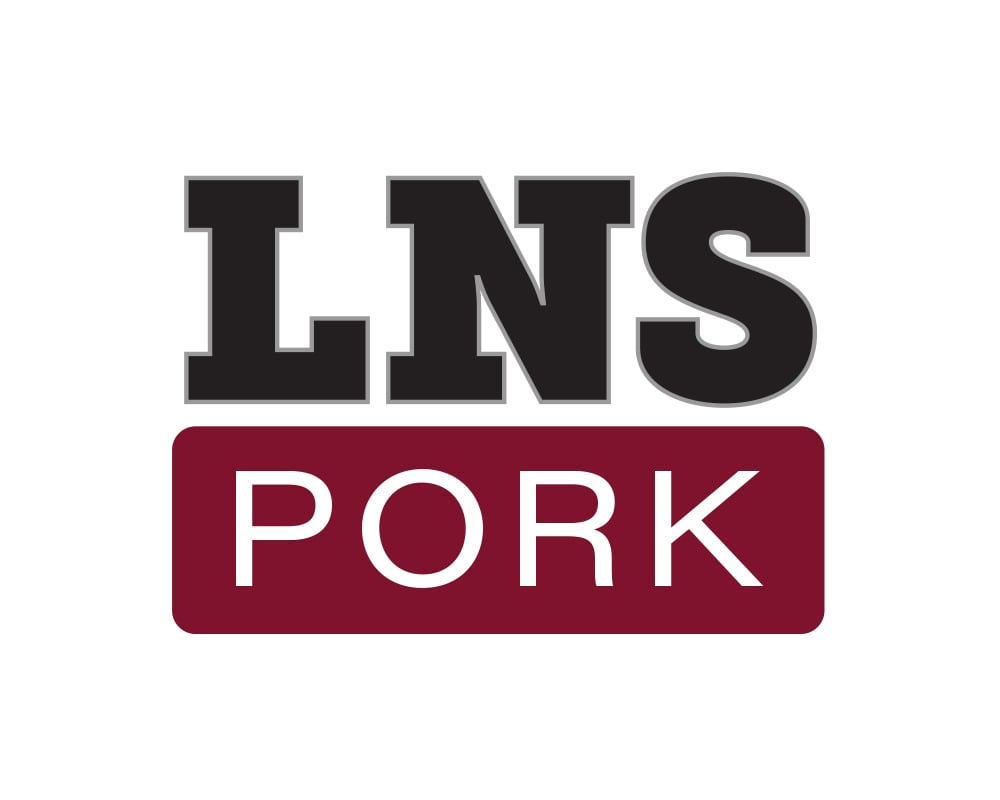 LNS Pork’s ground-mounted solar panels, with their company logo in the top right-hand corner, representing one of SunPeak’s commercial solar power projects. 
