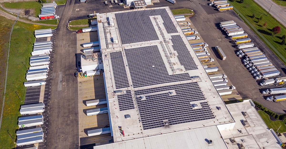 Rooftop solar panels on a commercial building representing the structural analysis process for a solar installation